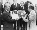 <p> Canada Prime Minister Pierre Trudeau presented Gerald Ford with a book filled with pictures of boundaries as a symbol of peace. &quot;People usually think of boundaries as dividing people,&quot; Trudeau&#xA0;said in the exchange. &quot;...We will see in pictures what everyone knows on your side and on our side of the boundary&#x2014;that these boundaries don&apos;t divide us. They bring us together.&quot; It was presented as a Bicentennial gift. </p>