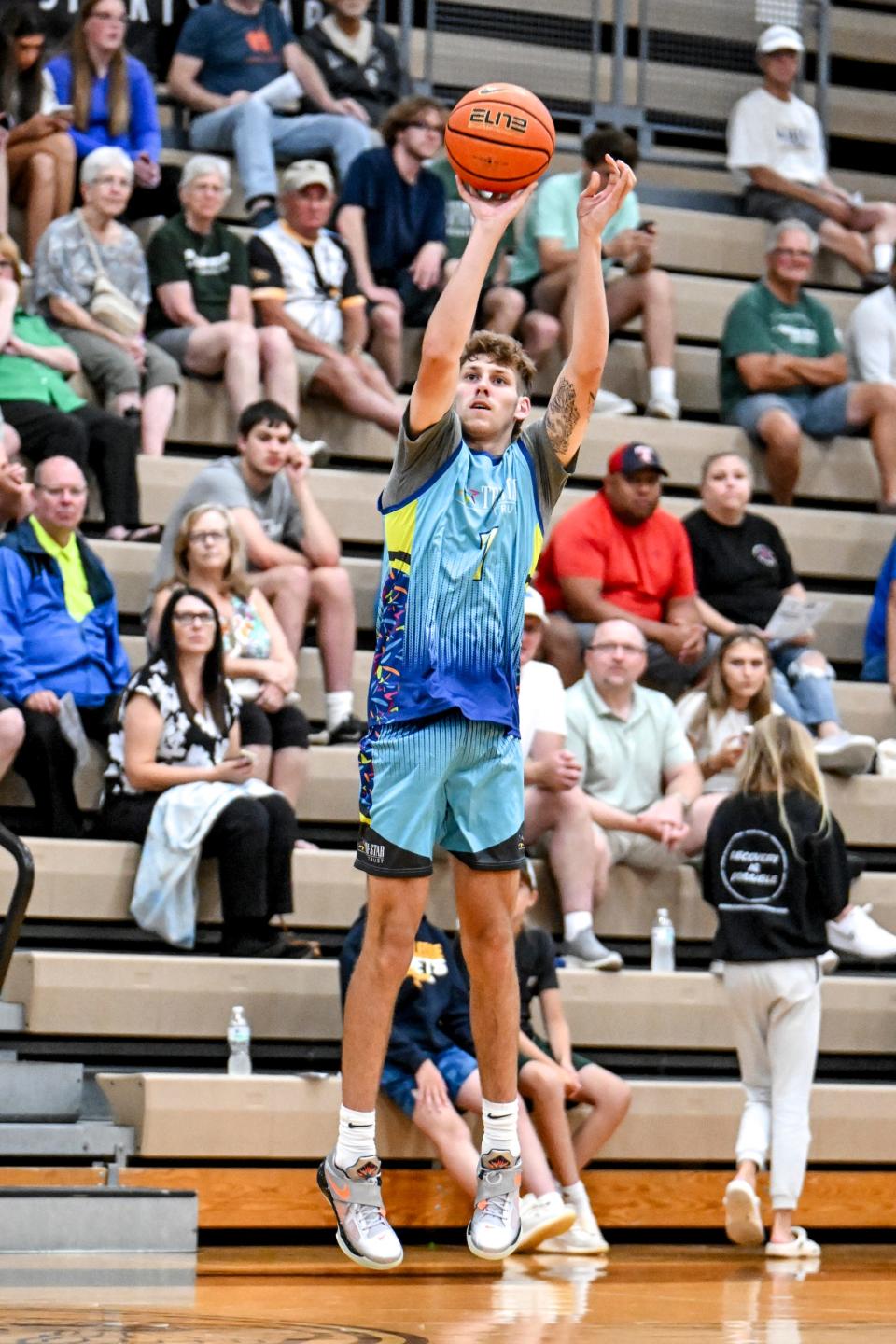 Michigan State and Team Tri-Star Trust's Gehrig Normand shoots a 3-pointer in the game against Team Motorcars on Tuesday, June 25, 2024, during the Moneyball Pro-Am at Holt High School., Nick King/Lansing State Journal