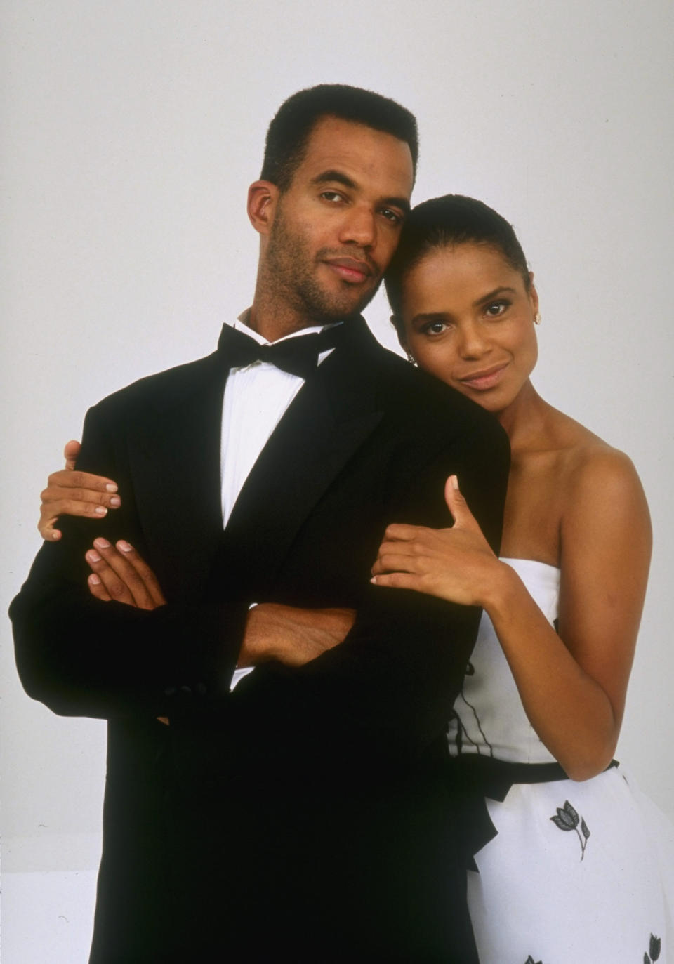 LOS ANGELES - JANUARY 1: Kristoff St. John (left, as Neil Winters) and Victoria Rowell (right, as Drucilla Barber Winters) star in THE YOUNG AND THE RESTLESS. January 1, 1997. (Photo by Monty Brinton/CBS via Getty Images) 