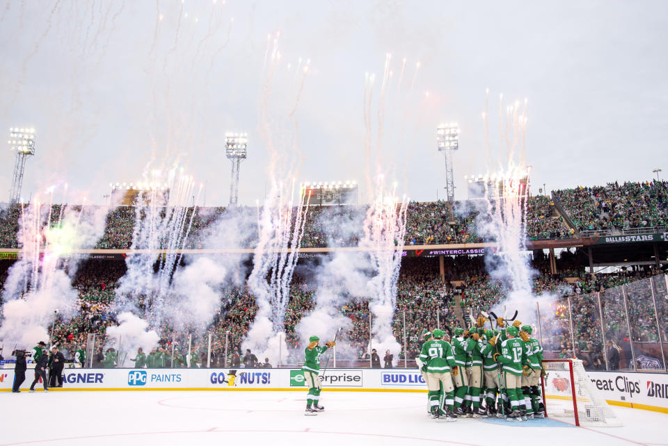 The Dallas Stars celebrate their 4-2 victory over the Nashville Predators at the end of the NHL Winter Classic hockey game at the Cotton Bowl, Wednesday, Jan. 1, 2020, in Dallas. (AP Photo/Jeffrey McWhorter)