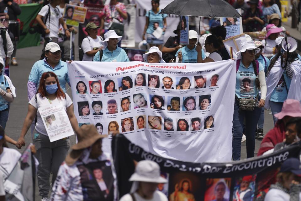 People attend the annual National March of Searching Mothers, held every Mother's Day in Mexico City, Friday, May 10, 2024. The marchers say the government lacks interest in investigating the disappearances of Mexico’s over 100,000 missing people. (AP Photo/Marco Ugarte)