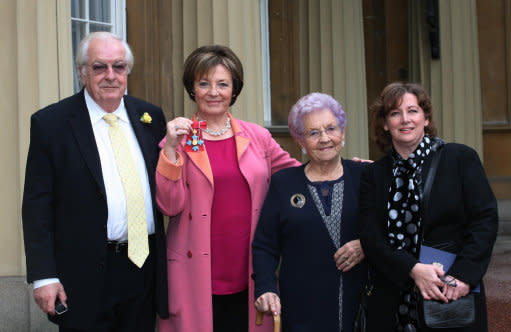 Delia Smith, with (from left) her husband Michael Wynn Jones, mother Etty Smith and manager Melanie Grocott, after she received her Commander of the British Empire Medal (CBE) from the Prince of Wales at an investiture ceremony at Buckingham Palace. (Katie Collins/PA Archive/PA Images)