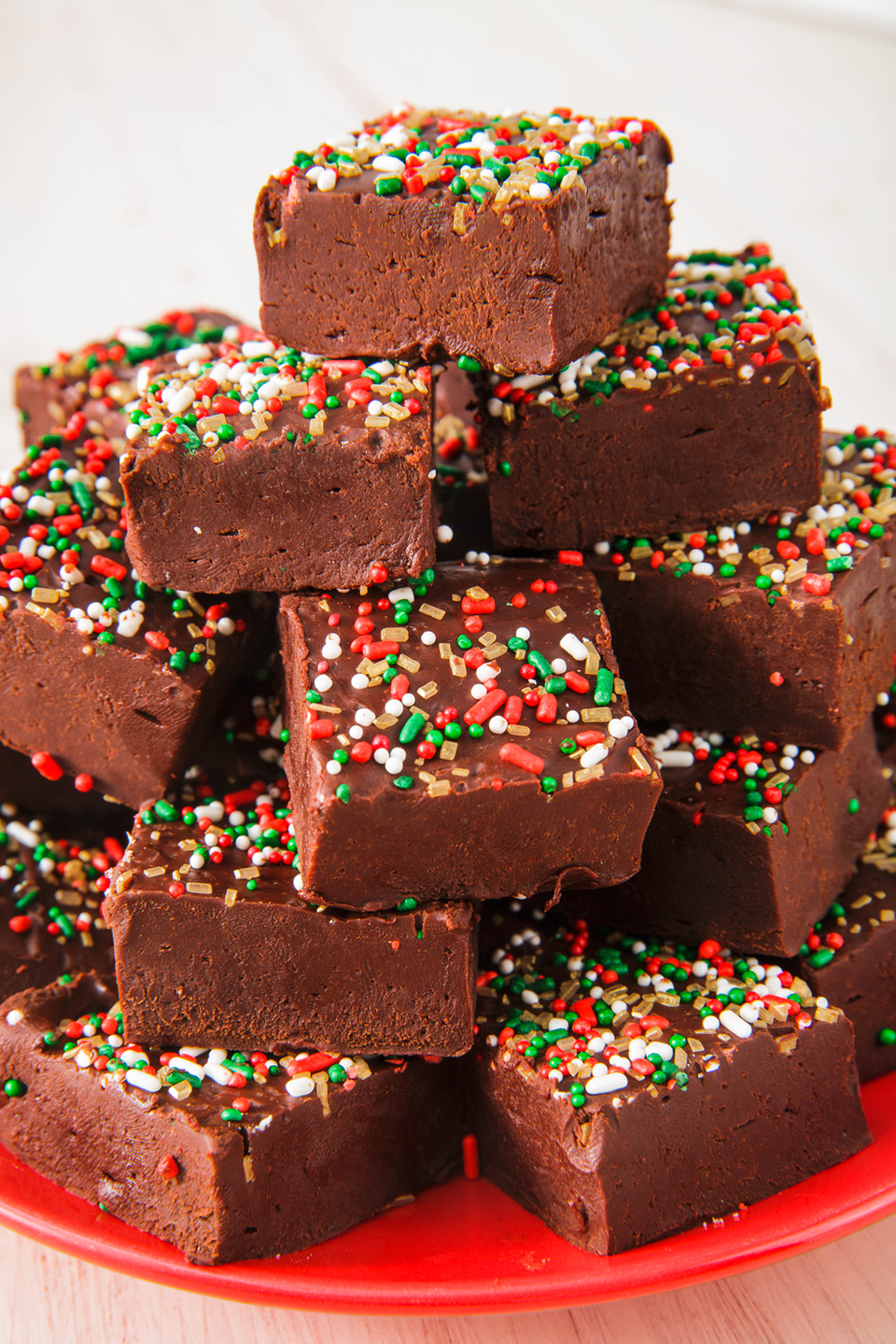 <p>Nothing says the holidays quite like Christmas fudge. We made ours more chocolatey and less sugary, and it might just be the best <a href="https://www.delish.com/cooking/g3256/easy-fudge-recipes/" rel="nofollow noopener" target="_blank" data-ylk="slk:fudge;elm:context_link;itc:0;sec:content-canvas" class="link ">fudge</a> we've ever had.</p><p>Get the <strong><a href="https://www.delish.com/holiday-recipes/christmas/a24893196/christmas-fudge-recipe/" rel="nofollow noopener" target="_blank" data-ylk="slk:Christmas Fudge recipe;elm:context_link;itc:0;sec:content-canvas" class="link ">Christmas Fudge recipe</a>.</strong></p>