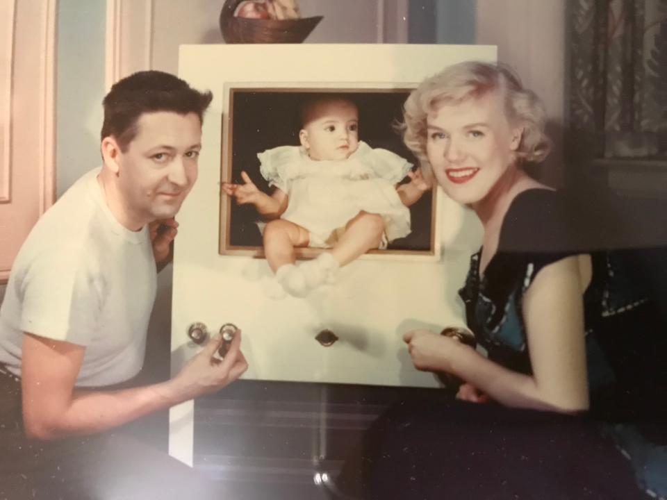 Married couple Jack and Jytte Jacobsen pose with their daughter, Christine Jacobsen, in the 1950s, when she was a baby.