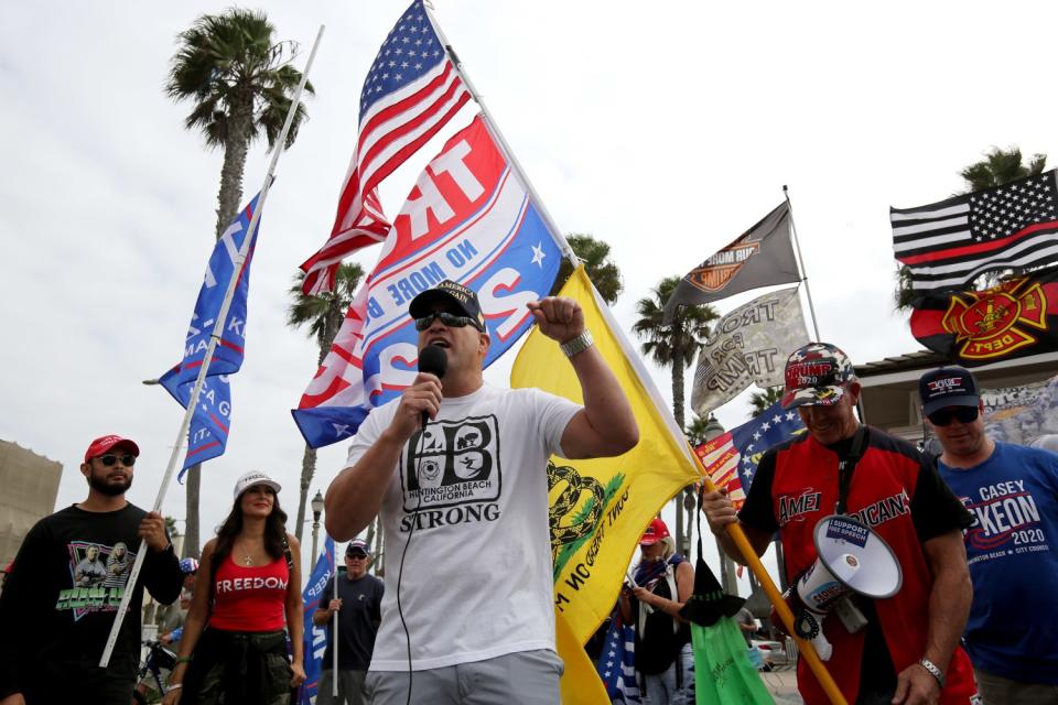 Then city council candidate Tito Ortiz speaks to the crowd during Trump rally at the pier, in Huntington Beach