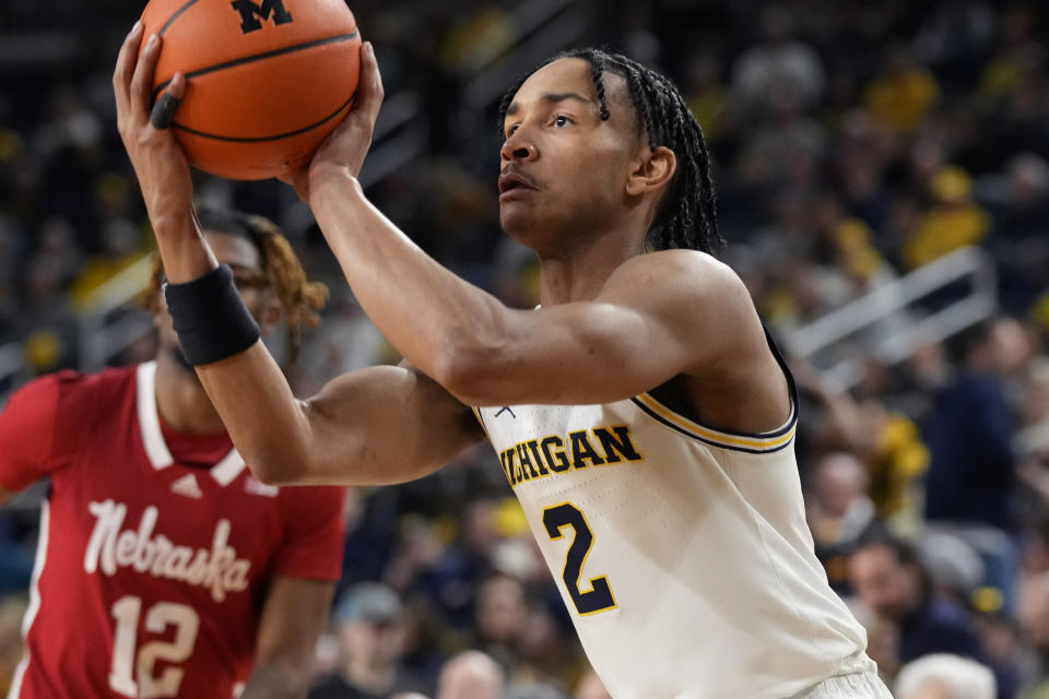 Michigan guard Kobe Bufkin (2) attempts a three-point basket during the second half of an NCAA college basketball game against Nebraska, Wednesday, Feb. 8, 2023, in Ann Arbor, Mich. (AP Photo/Carlos Osorio)