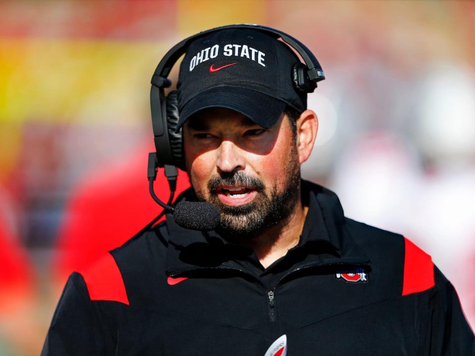 Ryan Day speaks into his headset during a game in 2021.