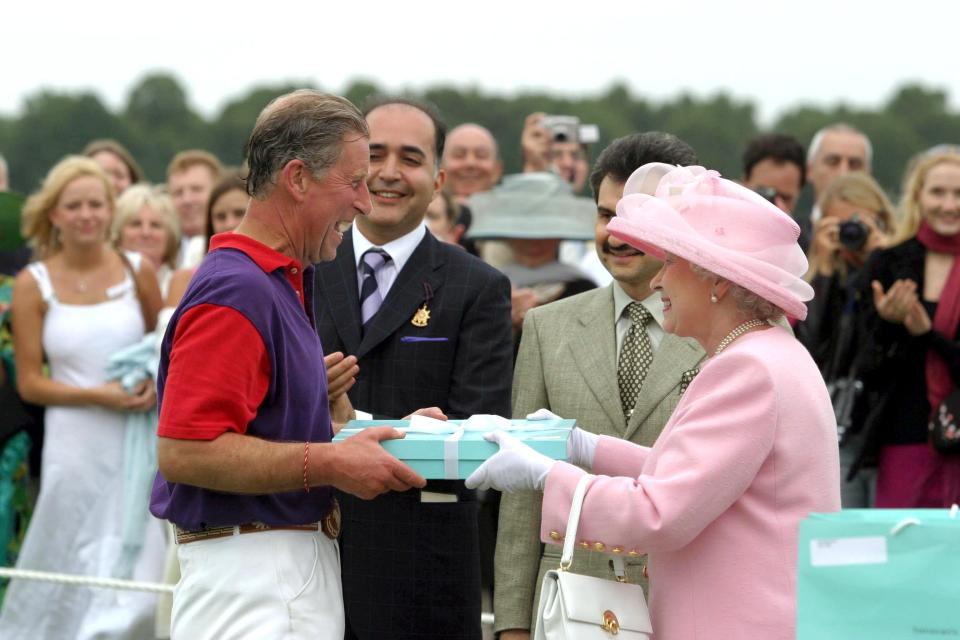 Queen Elizabeth and Prince Charles (now King Charles) at a polo game in 2003