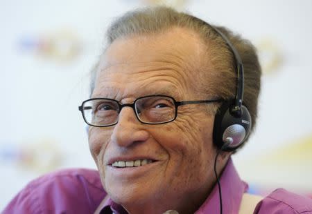 FILE PHOTO: U.S. television personality Larry King smiles during a news conference in Bratislava September 22, 2011. Larry King is in Slovakia at the invitation of private news channel TA3, which celebrates its 10th anniversary this week. REUTERS/Radovan Stoklasa