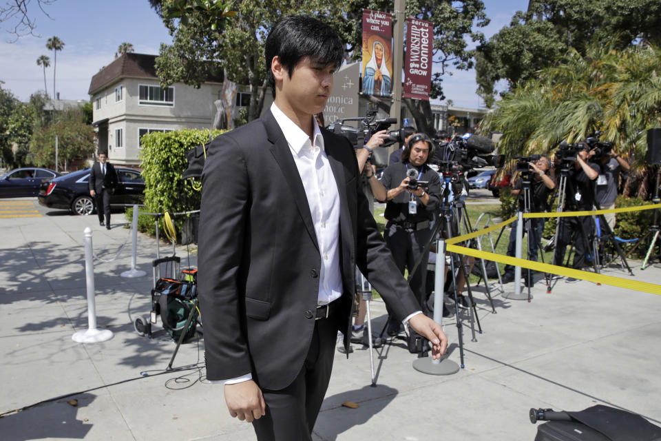 Los Angeles Angels player Shohei Ohtani arrives for a memorial for Angels pitcher Tyler Skaggs at the St. Monica Catholic Church Monday, July 22, 2019, in Los Angeles. (AP Photo/Marcio Jose Sanchez)