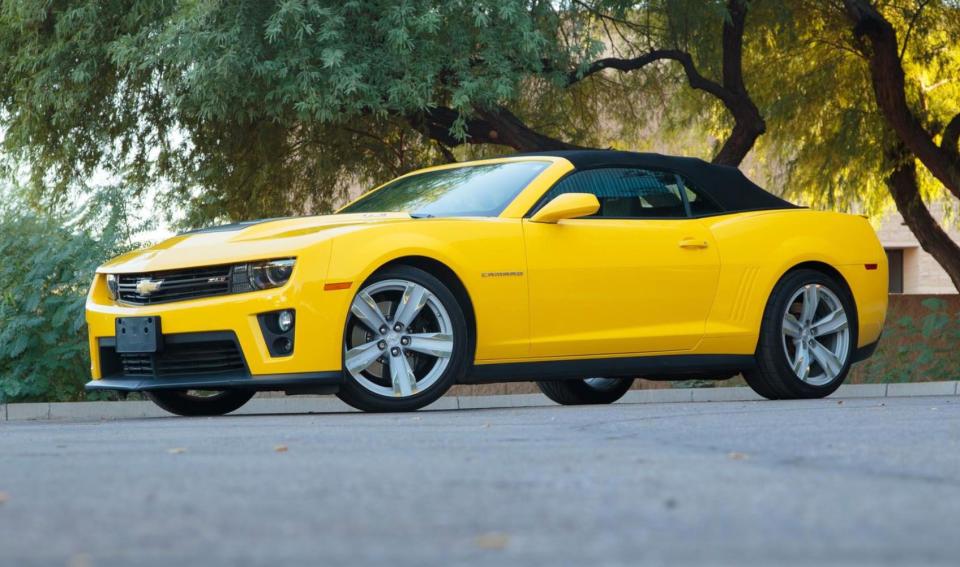 <img src="auction-2013-camaro-zl1.jpg" alt="A 2013 Chevrolet Camaro ZL1 convertible in rare Rally Yellow">