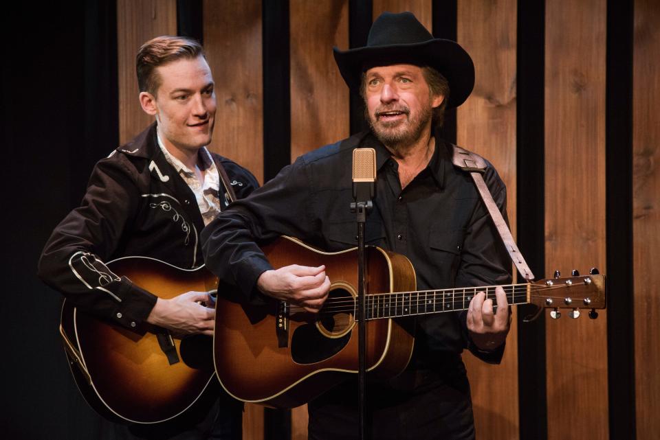 Scott Wakefield, right, plays a country music legend who hopes his son, played by Caleb Adams, left, will follow in his footsteps in the musical “Troubadour” at Florida Studio Theatre.