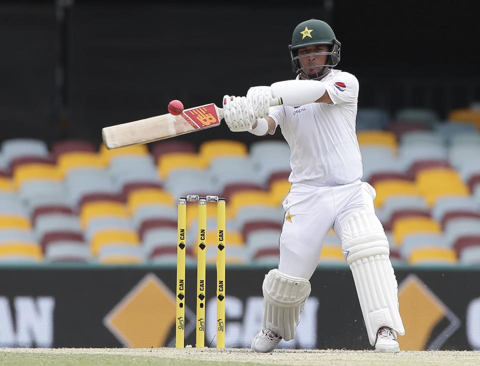 Pakistan's Yasir Shah plays a shot during play on the final day of the first cricket test between Australia and Pakistan in Brisbane, Australia, Monday, Dec. 19, 2016. (AP Photo/Tertius Pickard)