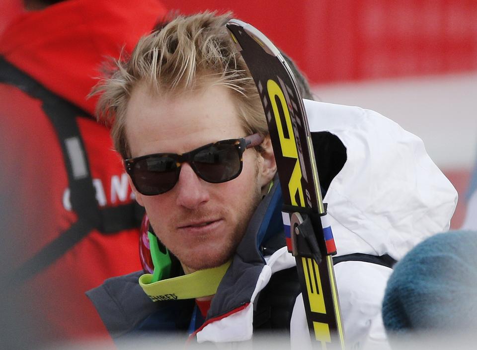 United States' Ted Ligety stands near the finish area after completing Men's super combined downhill training at the Sochi 2014 Winter Olympics, Tuesday, Feb. 11, 2014, in Krasnaya Polyana, Russia. (AP Photo/Christophe Ena)