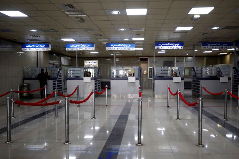 Passport control counters are pictured inside Aleppo international airport