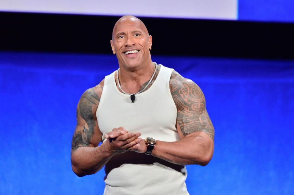 Dwayne Johnson has kissed Emily Blunt on-screen, but she has also said, “I love him.” Getty Images for CinemaCon