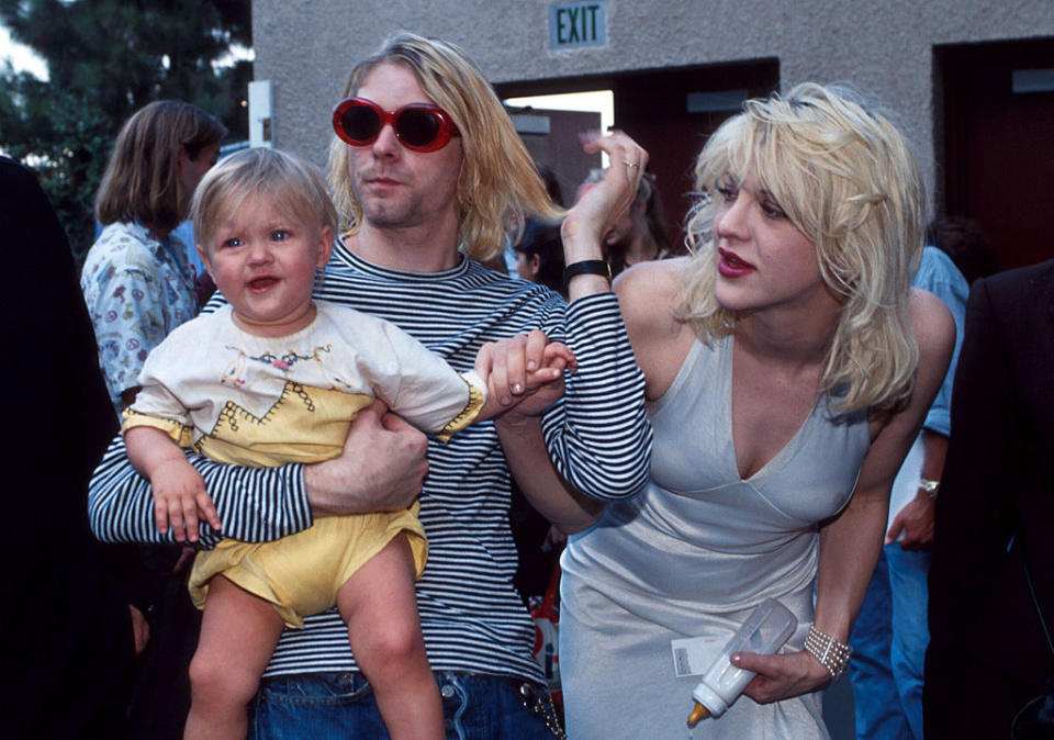 kurt and courtney are holding their baby and frances is crying