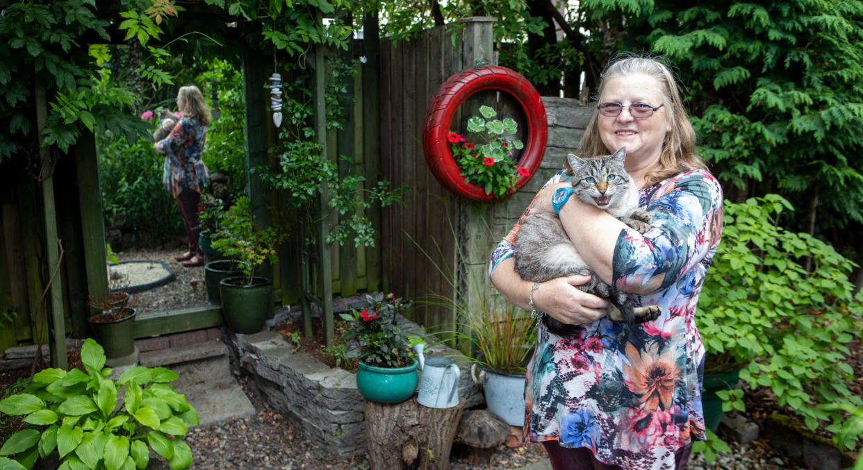 A woman has created a beautiful garden from other people's rubbish. (SWNS)