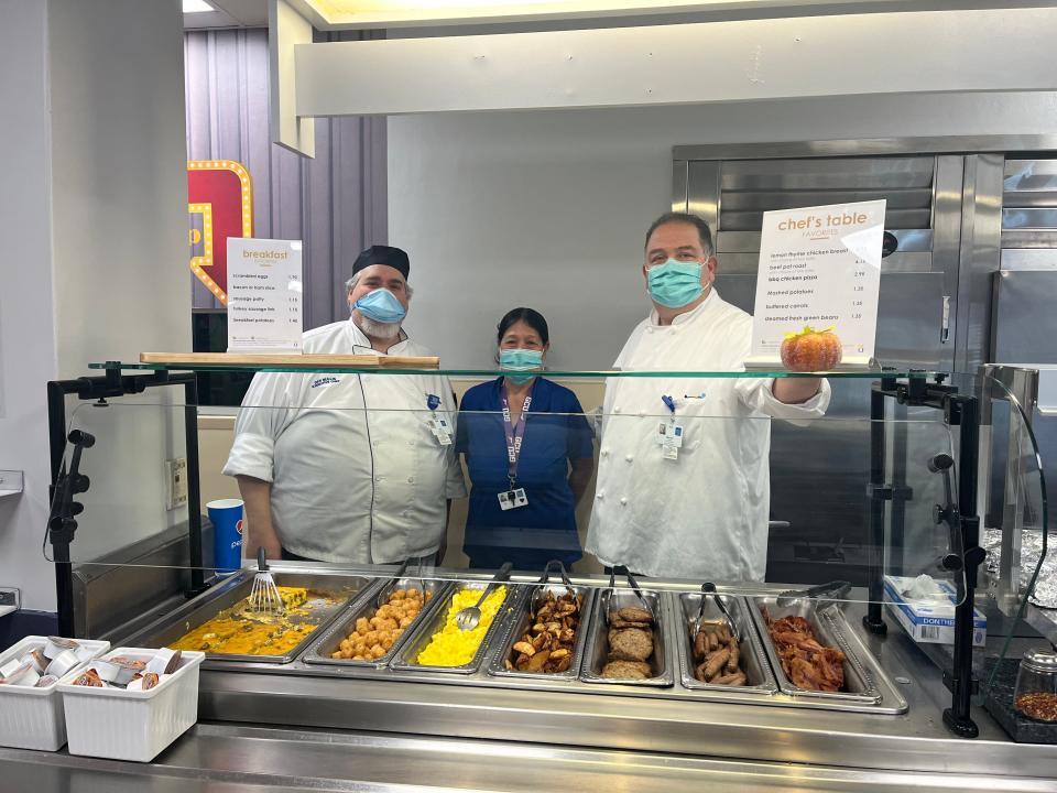 From left are executive chef Dan Bullis, Linda Griffin, and Area General Manager Marcello Raffaelle in the Portsmouth Regional Hospital cafeteria.