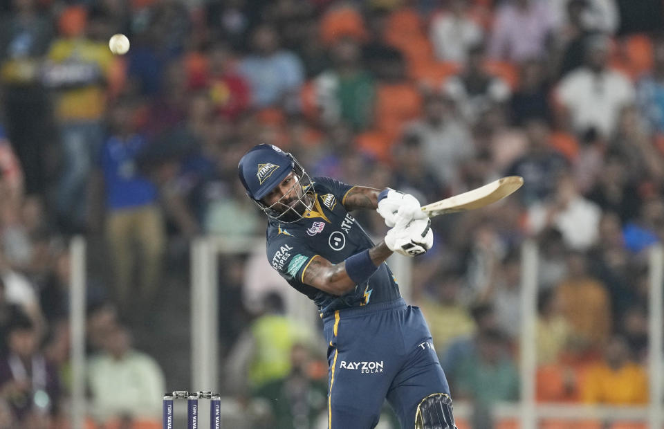 Gujrat Titans' captain Hardik Pandya plays a shot during the Indian Premier League qualifier cricket match between Gujarat Titans and Mumbai Indians in Ahmedabad, India, Friday, May 26, 2023. (AP Photo/Ajit Solanki)