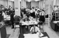 FILE - In this Nov. 3, 1964, file photo, staffers work on election night at the Washington, D.C. bureau of The Associated Press. As it has for more than 170 years, The Associated Press will count the vote and report the results of presidential, congressional and state elections quickly, accurately and without fear or favor on Nov. 3 and beyond. (AP Photo/File)