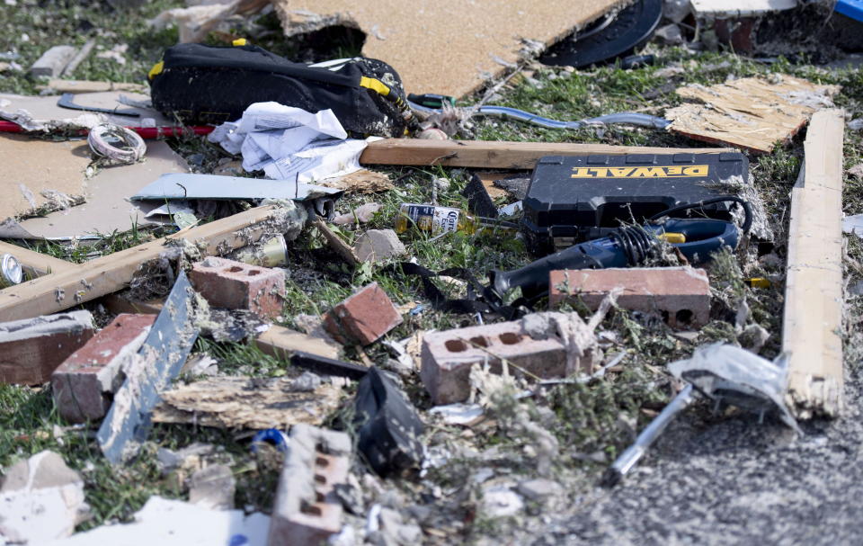 <p>Power tools and a bottle of beer lie among debris at a home destroyed by a tornado in Dunrobin, Ont., west of Ottawa, on Saturday, Sept. 22, 2018. The storm tore roofs off of homes, overturned cars and felled power lines in the Ottawa community of Dunrobin and in Gatineau, Que. (Photo from Justin Tang/The Canadian Press) </p>