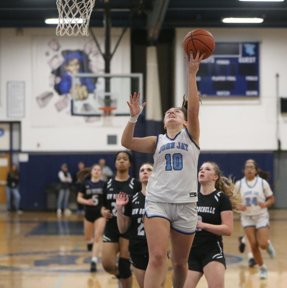 John Jay's Grace Kennedy goes for a layup during a Section 1 Class AAA girls basketball quarterfinal game against New Rochelle on Feb. 23, 2024.