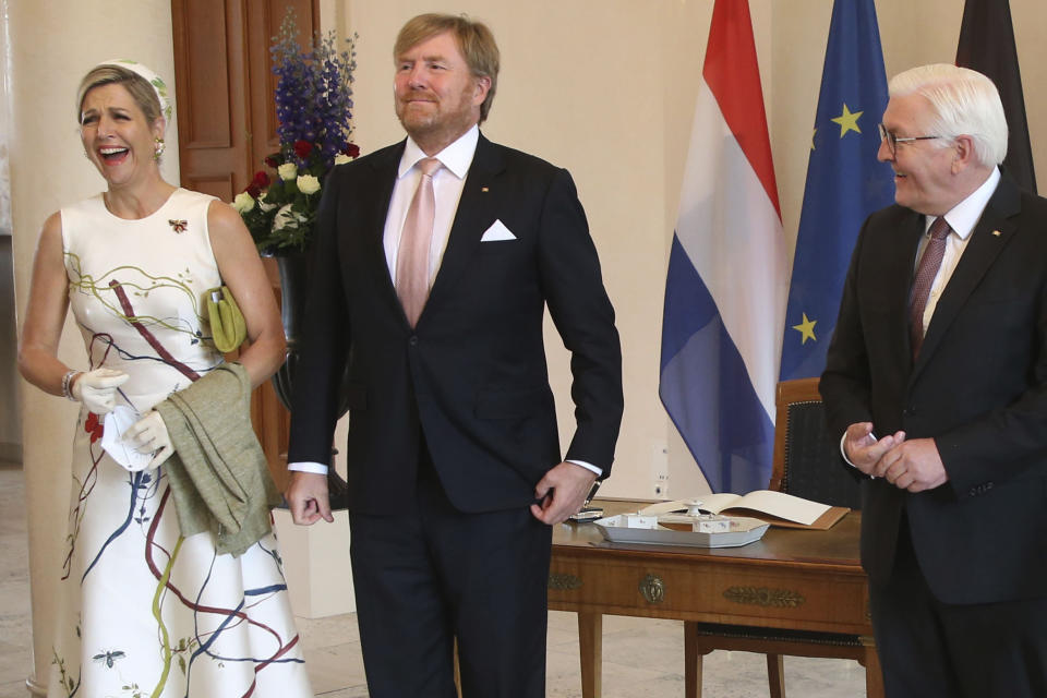 German president Frank-Walter Steinmeier, right, welcomes King Willem-Alexander of the Netherlands and Queen Maxima at the Bellevue palace in Berlin, Germany, Monday, July 5, 2021. The Royals arrived in Germany for a three-day visit that was delayed from last year because of the coronavirus pandemic. (Wolfgang Kumm/dpa via AP)