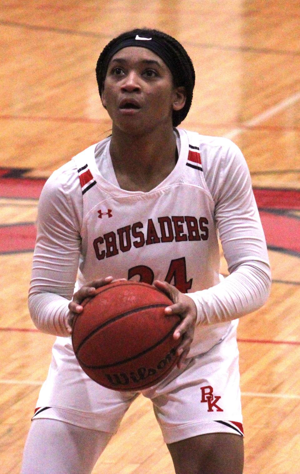 Bishop Kenny's Jasmyne Roberts (24) prepares to shoot the game-clinching free throws with two seconds remaining in overtime during a February 2021 high school playoff against Raines.