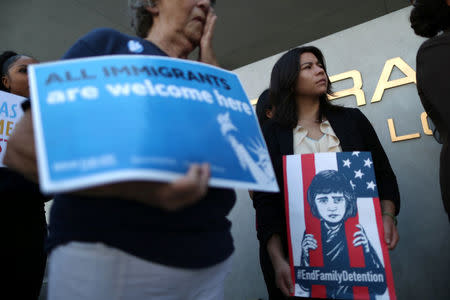 People attend a protest against conditions in Adelanto Immigration Detention Center, outside ICE headquarters in Los Angeles, California, U.S. July 24, 2018. REUTERS/Lucy Nicholson