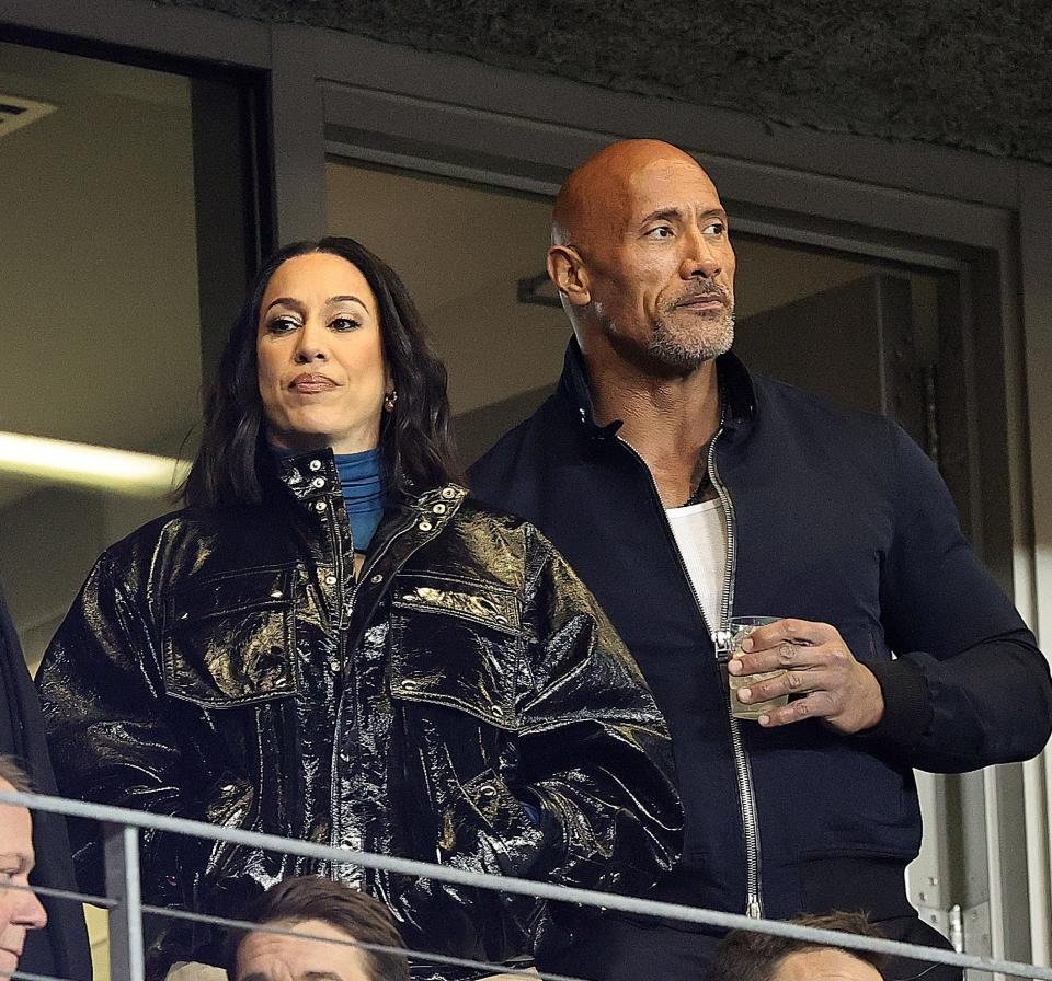 Dany Garcia and Dwayne "The Rock" Johnson attend the XFL game between the Orlando Guardians and Houston Roughnecks on Feb. 18.