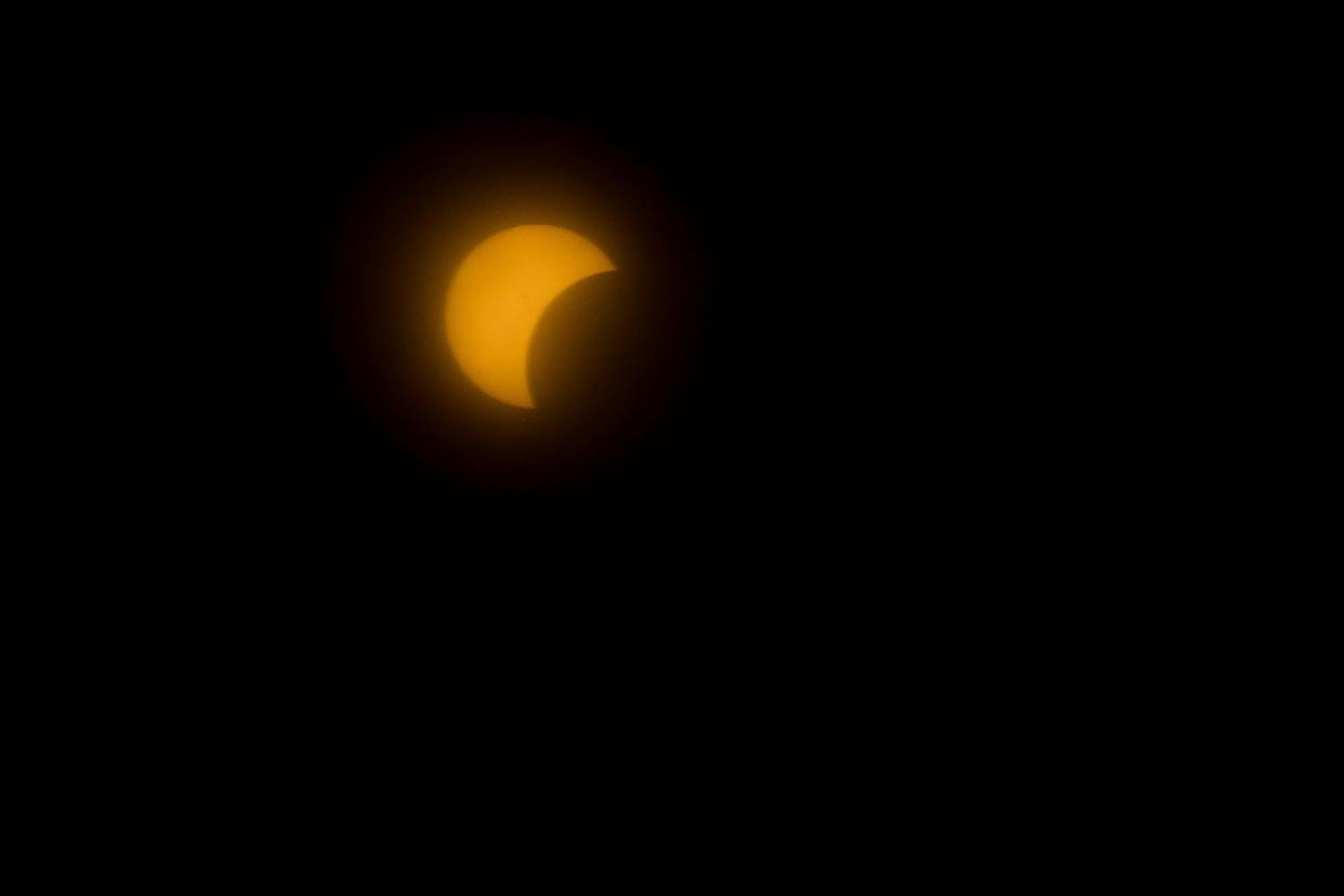 A partial solar eclipse is seen from El Paso, TX, on April 8, 2024. Guests were invited to watch portions of the solar eclipse, which will be partially seen in El Paso at about 82.1% at La Perla, the highest open-air rooftop in El Paso, TX, in the Plaza Hotel, on Monday, April 8, 2024.
