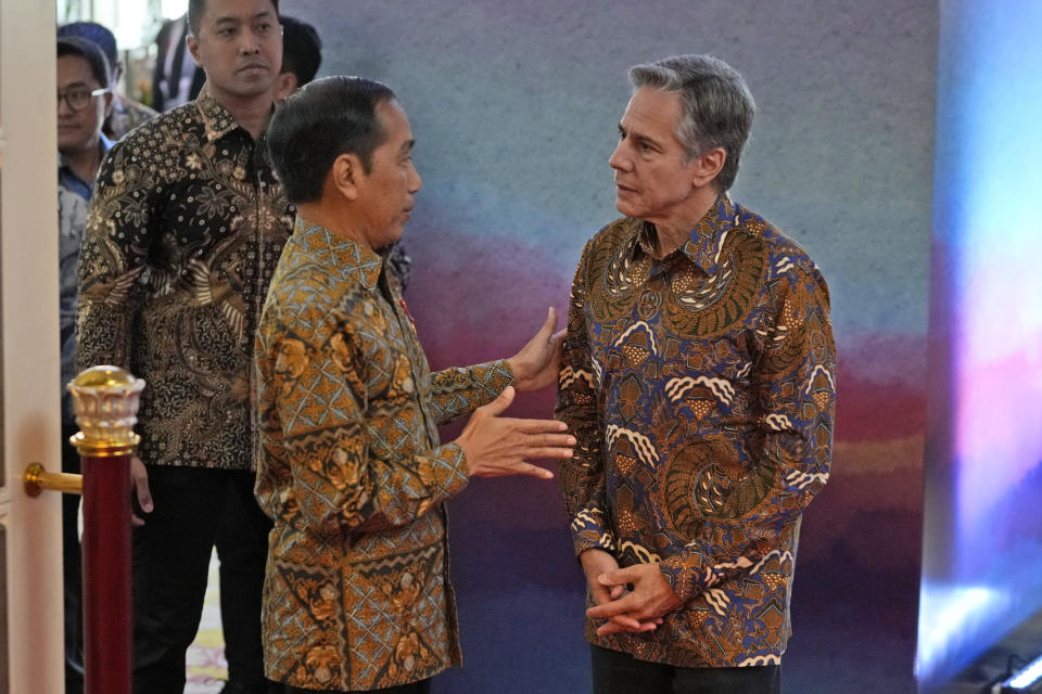Indonesian President Joko Widodo, left, talks with U.S. Secretary of State Antony Blinken during the courtesy calls of ministers at the Association of Southeast Asian Nations (ASEAN) Foreign Ministers' Meeting in Jakarta, Indonesia, Friday, July 14, 2023. (AP Photo/Achmad Ibrahim, Pool)
