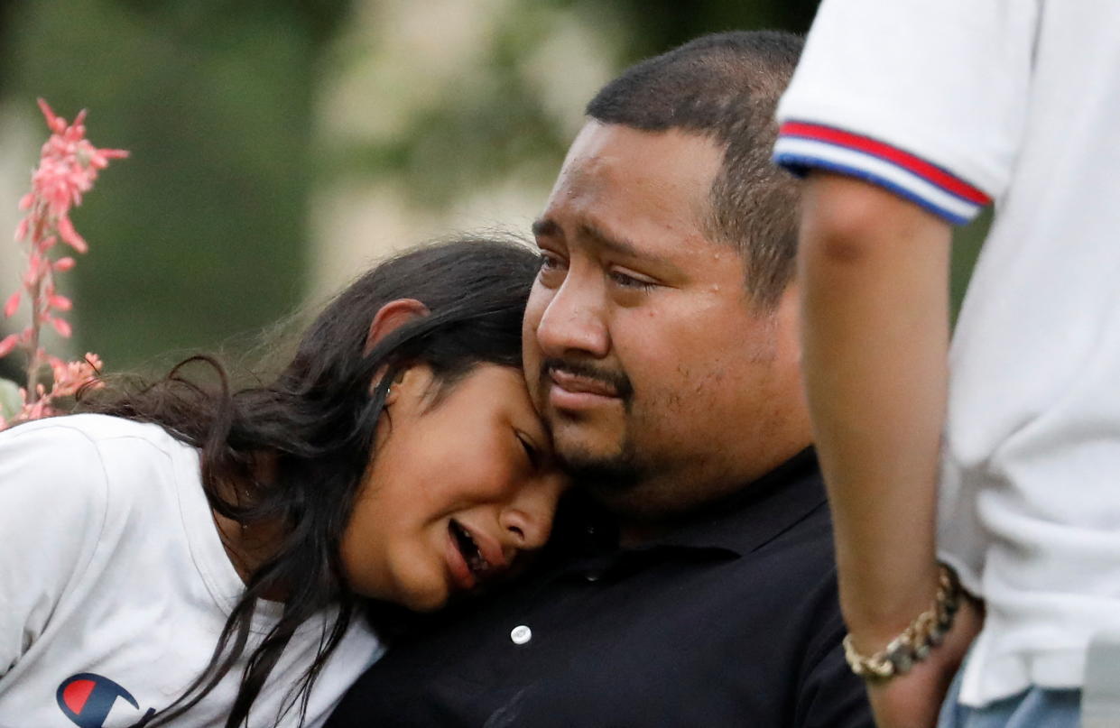 People react after the mass shooting at an elementary school in Uvalde, Texas, on Tuesday. 