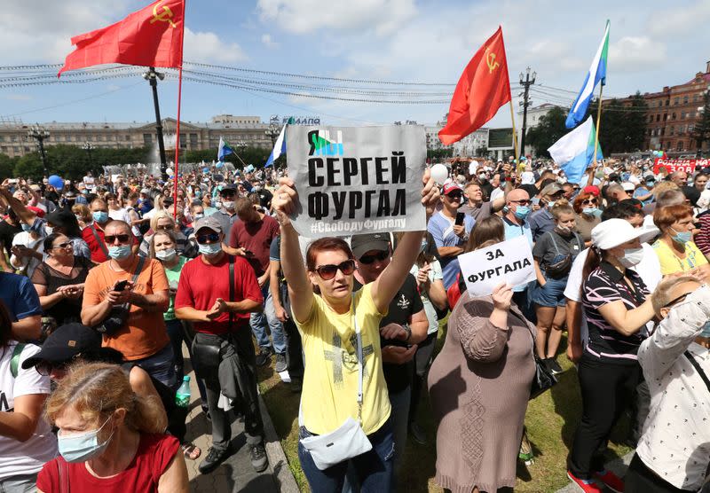 People take part in a rally in support of former regional governor Sergei Furgal in Khabarovsk