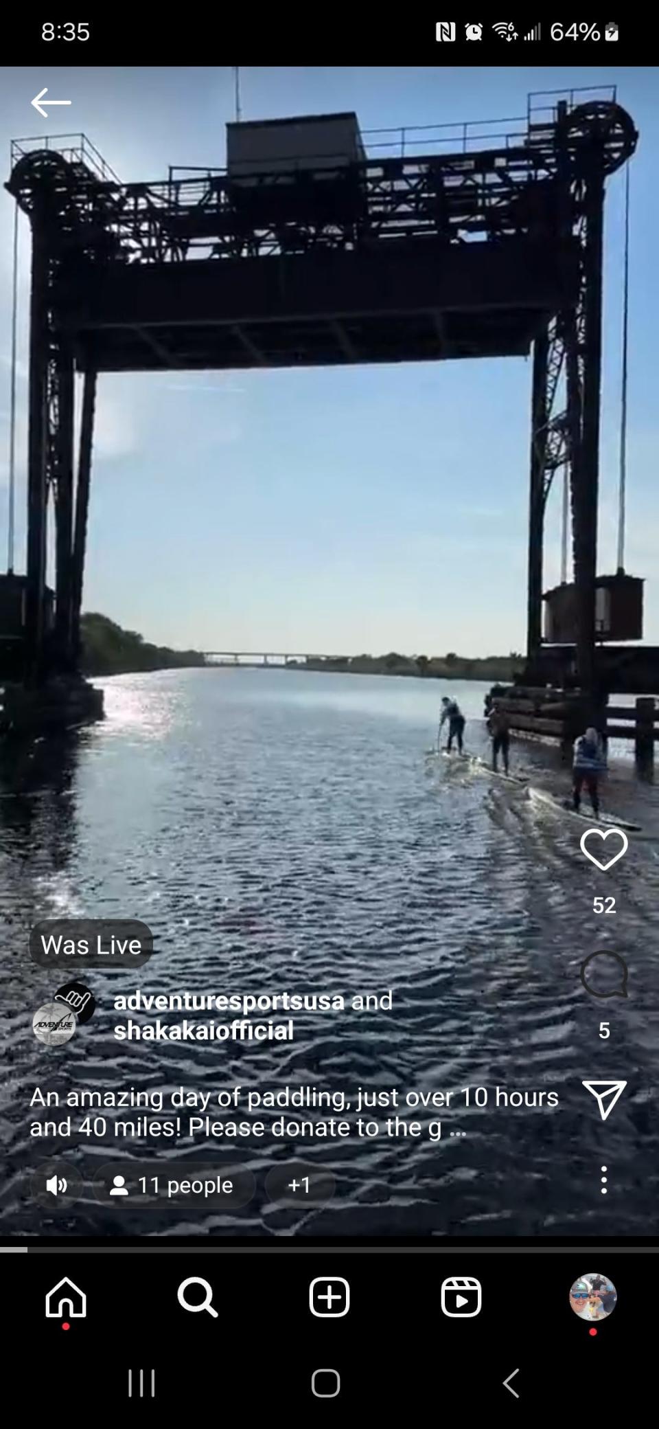 Paddleboarders in the C-44 Canal approach the railroad lift bridge east of Port Mayaca in western Martin County on March 8, 2024.