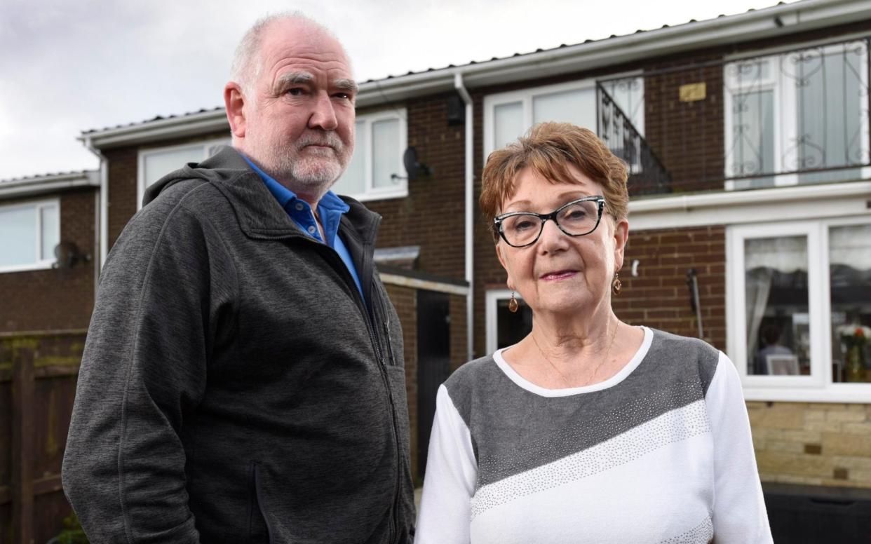 Kathleen Birtley and her son-in-law Gordon Crosthwaite outside her home in West Denton, Newcastle upon Tyne