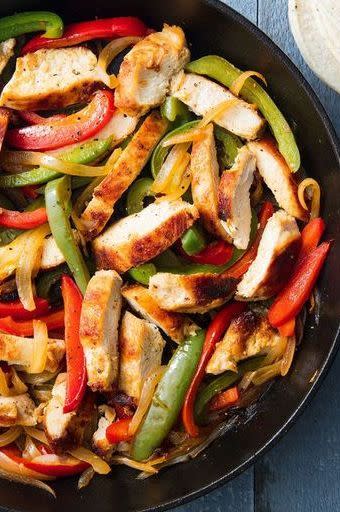 <p>Fajitas are the perfect weeknight dinner. Minimal prep and minimal cook time means these can be on your table FAST. </p><p>Get the <a href="https://www.delish.com/uk/cooking/recipes/a30146397/easy-chicken-fajitas-recipe/" rel="nofollow noopener" target="_blank" data-ylk="slk:Chicken Fajitas;elm:context_link;itc:0;sec:content-canvas" class="link ">Chicken Fajitas</a> recipe.</p>