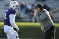 Northwestern head coach Pat Fitzgerald, right, yells to quarterback Aidan Smith (11) during the second half of an NCAA college football game against Purdue, Saturday, Nov. 9, 2019, in Evanston, Ill. Purdue won 24-22. (AP Photo/Paul Beaty)