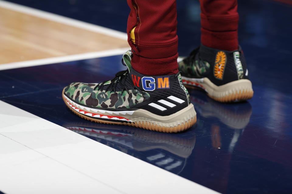 Cleveland Cavaliers guard Alec Burks (10) wears Adidas shoes in the first half of an NBA basketball game Saturday, Jan. 19, 2019, in Denver. (AP Photo/David Zalubowski)