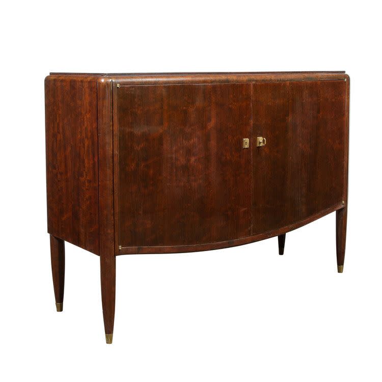 <p><a href="https://www.highstyledeco.com/cabinets/art-deco-directoire-style-burled-amp-bookmatched-acacia-cabinet-w-bronze-fittings" rel="nofollow noopener" target="_blank" data-ylk="slk:Shop Now;elm:context_link;itc:0;sec:content-canvas" class="link ">Shop Now</a></p><p>Signed Jules Leleu Art Deco Directoire Style Burled & Bookmatched Acacia Cabine</p><p>highstyledeco.com</p><p>$18475.00</p>