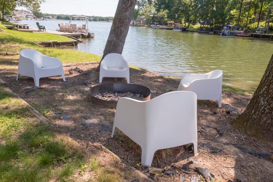 A firepit, some comfortable seating and the peaceful feeling of living on the water all provide a great way to relax.