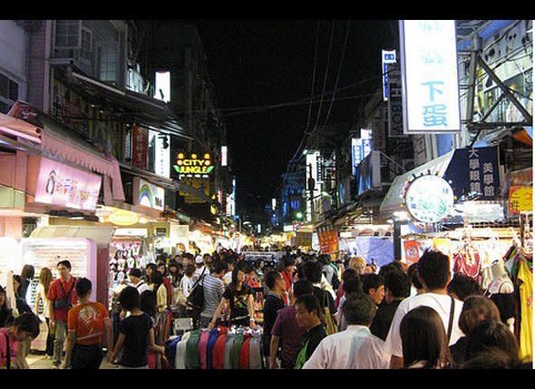 Taiwan is heaven for midnight snackers: There are several large night markets in every city that sell clothing, consumer goods, food -- including xiaochi, Taiwanese dim sum, and drinks. Night markets tend to open around 6 p.m. and don't close until after midnight. They are also generally rather crowded, so be prepared.     Shilin Night Market is Taipei's largest and most famous night market -- its food court holds 539 stalls. One of Shilin's most tasty treats is aiyu jelly, a local delicacy that can be found in few other countries. The jelly, made from a Taiwanese figs, is normally considered a summer drink, but is sold all year round. To find it at the night market, look for booths with large silver tubs decorated with pictures of limes, or for signs advertising frogs eggs. "Frogs eggs" are large tapioca balls served with aiyu jelly in a lemon drink -- so don't get queasy.    Photo: <a href="http://www.flickr.com/photos/ludington/2552395028/in/photostream/" target="_hplink">jakeludington</a>/Flickr