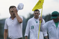 Justin Thomas wipes his forehead after finishing on the 18th hole during the third round of the Masters golf tournament on Saturday, April 10, 2021, in Augusta, Ga. (AP Photo/David J. Phillip)