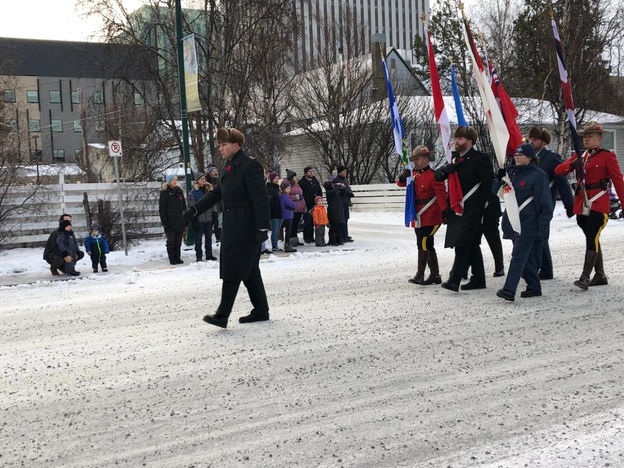 Remembrance Day services in Yellowknife on Saturday started with a military parade through the downtown. (Sarah Krymalowski/CBC - image credit)