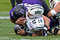 Ohio quarterback Armani Rogers (18) is sacked by Northwestern defensive lineman Sean McLaughlin during the second half of an NCAA college football game in Evanston, Ill., Saturday, Sept. 25, 2021. Northwestern won 35-6. (AP Photo/Nam Y. Huh)