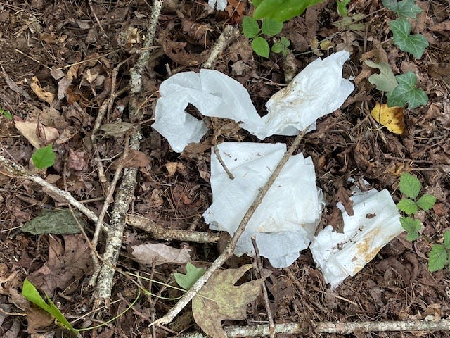 This is a photo of tissue and human feces on the property of the Braznell family, according to Colleen Braznell. Her property is located adjacent to the Ecusta Trail in Hendersonville.