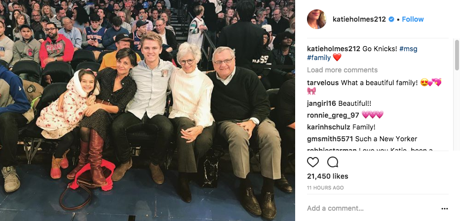 Katie shared a photo of her whole family at the game, but it's her likeness to Suri that has people's attention. Source: Instagram/KatieHolmes