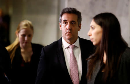Former Trump personal attorney Michael Cohen departs after testifying behind closed doors before the Senate Intelligence Committee on Capitol Hill in Washington, U.S., February 26, 2019. REUTERS/Carlos Barria