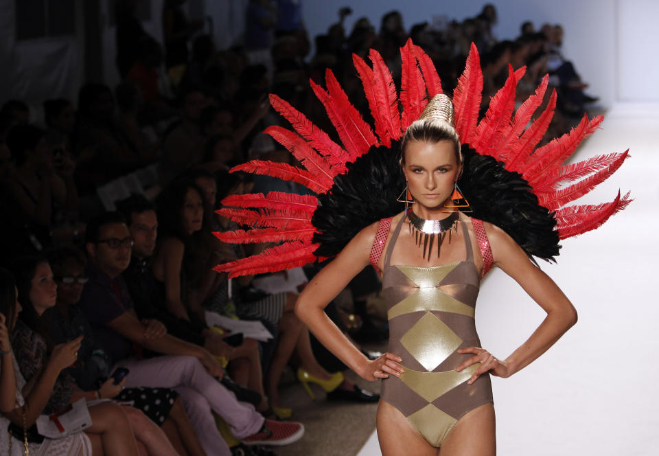 A model wears swimwear from the collection of Red Carter during the Mercedes-Benz Fashion Week Swim 2013 show, Sunday, July 22, 2012, in Miami Beach, Fla. (AP Photo/Lynne Sladky)